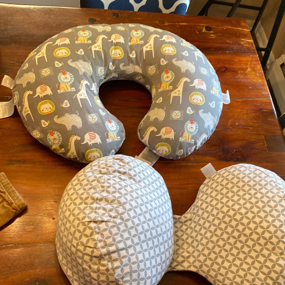 Two boppy pillows